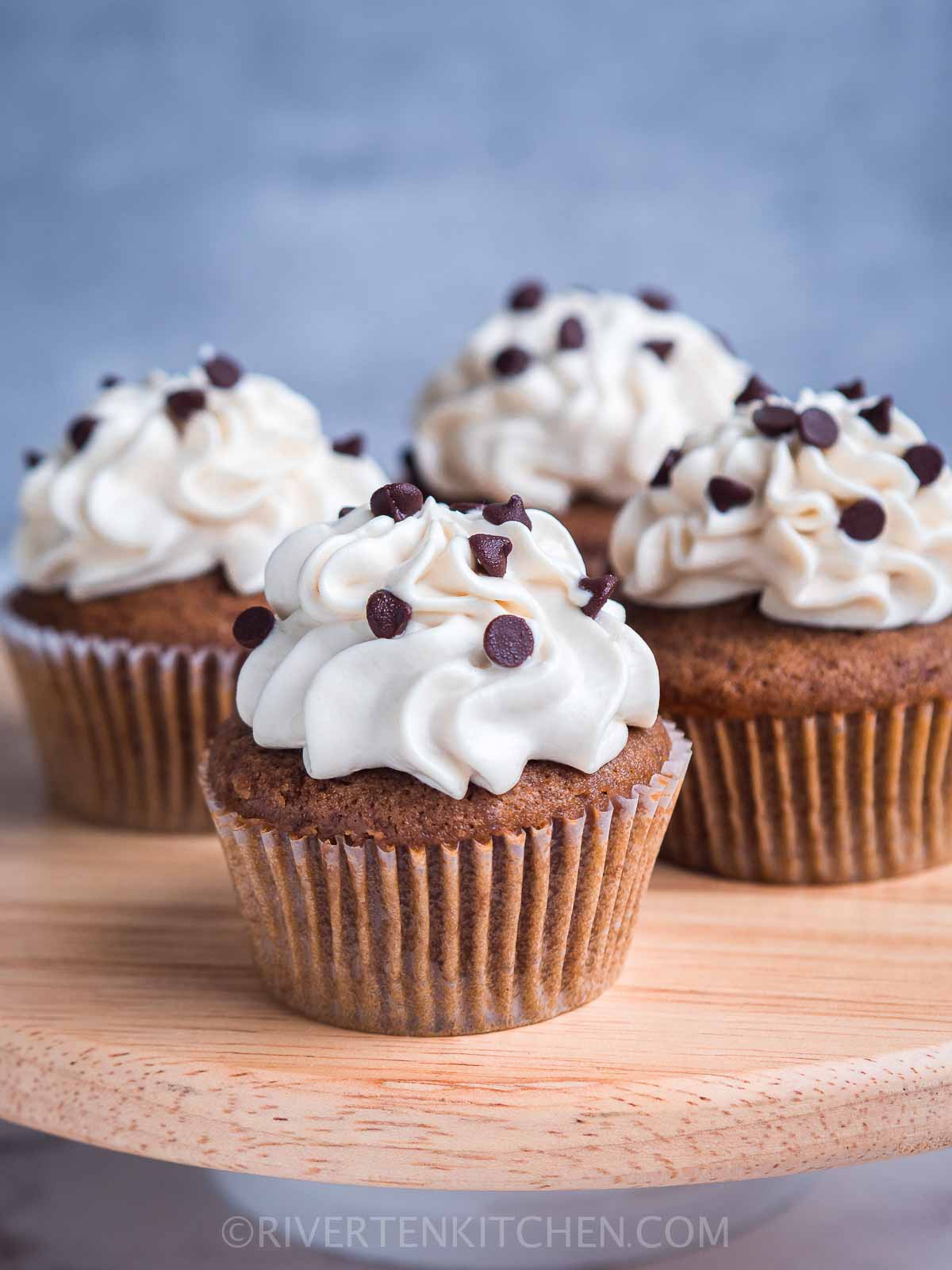 mocha flavored cupcake with whipped cream frosting